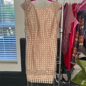 Plush pink 100% embellished crystal & pearl dress.